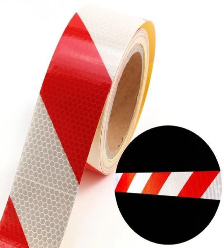 Bande réfléchissante 30m x 5cm rouge/blanc pour visibilité nocturne. Sécurité accrue.